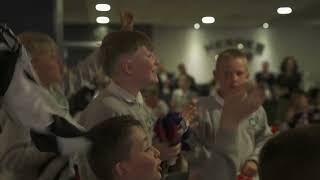 Young people react to Newcastle United players arriving at SRtRC event