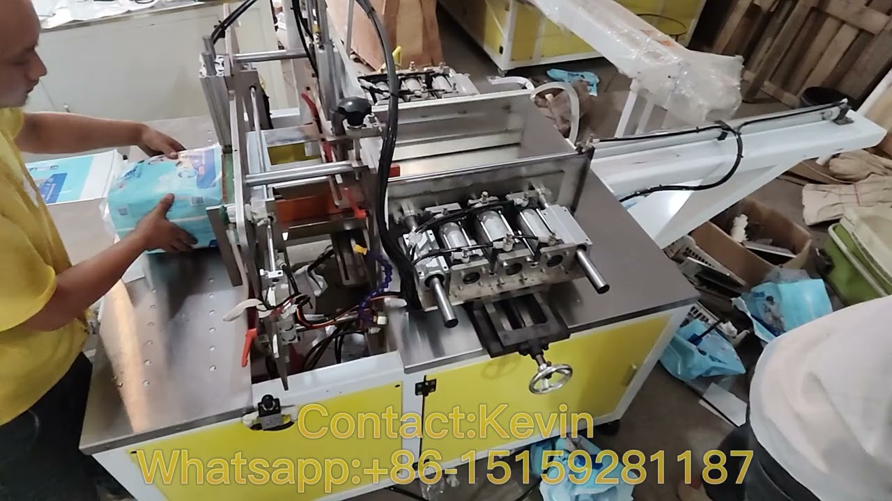Semi Auto Jumbo Baby Diaper Adult Diaper Packing Machine  Whatsapp: +86-15159281187