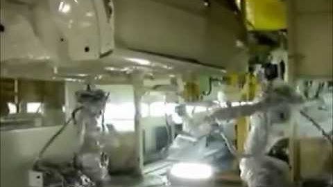 Motoman robots in automotive sealing application