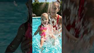 A cute child who isn't afraid of the pool