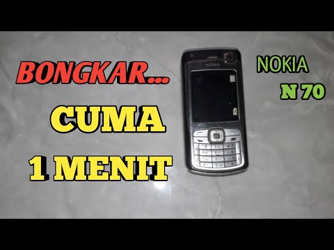 Video: Cara Membuka Penutup Nokia N70