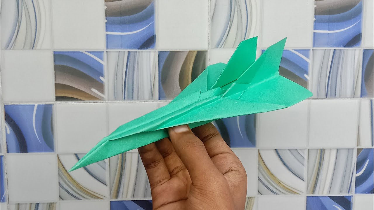 How to make a jet fighter paper airplane that fly far.#paperairplane# ...