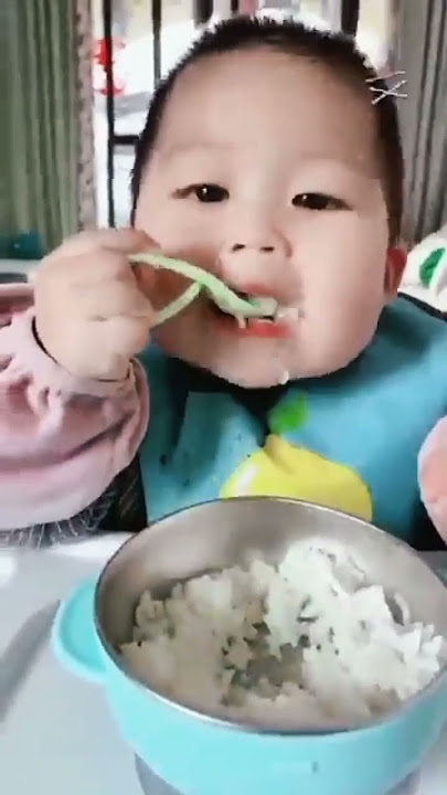 baby eating food 😂