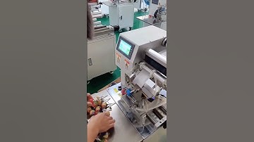 Lollipop labeling machine