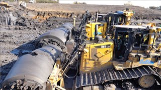 Three Dozers Rolling Sticky Clay