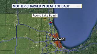 Woman charged after baby found dead in north suburban dumpster in 2001
