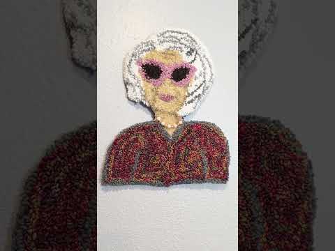 Old lady in Punch needle