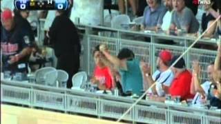 Chris Pajak catches ball bare handed in the Metropolitan Club at Target Field