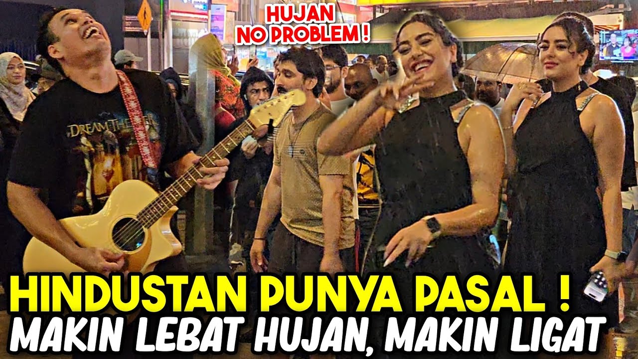 Walaupun hujan makin lebat tapi penonton tak berganjak.Tourist India buat scene filem Hindustan 