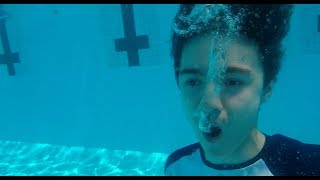 Kid Sings Halo Theme Song In A 2500kl Swimming Pool