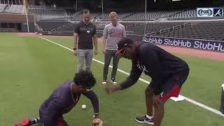 Ron Washington runs Braves rookie Ozzie Albies through fielding drills