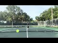 Warming up off the Slinger Tennis ball machine ground strokes with rubber band 