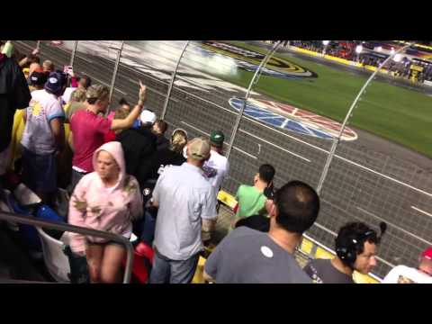 2013 Sprint All Star Race: Drunk NASCAR fan throws beer at Jimmie Johnson, gets slapped in the face.