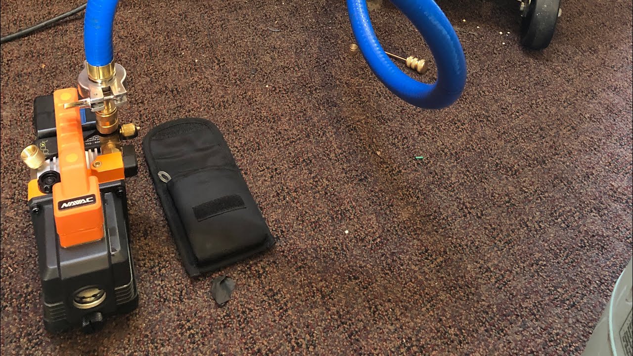 Navac 2cfm battery vacuum pump on a prep table YouTube