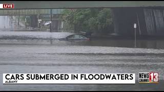 Uber driver recounts having to escape floodwaters in Albany with his passenger through a car window