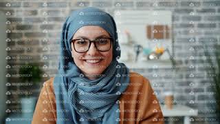Slow Motion Of Pretty Girl In Hijab Smiling Looking At Camera In Office