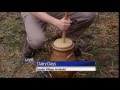 Reporter churns butter for Dairy Days