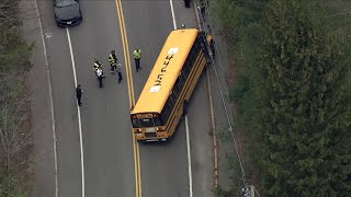 Vehicle collides with school bus in Plainville