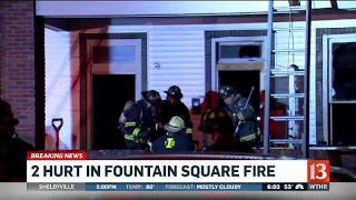 Firefighters pull 2 people from Fountain Square house fire