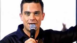 Watch Robbie Williams Handsome Man video