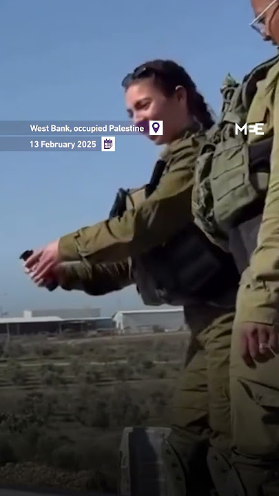 Israeli female soldier filmed throwing grenades over a West Bank fence