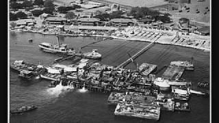 Salvage operations at pearl harbor on the uss oklahoma and utah
(righting operations) single photos of repaired battleships from duty
in ...