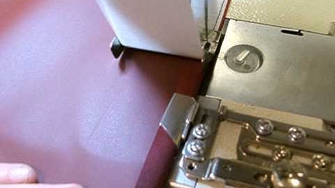 Velcro attaching machine