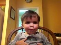 Little Brett having fun with my iPhone