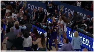 Flau’jae Johnson’s brother jumps on court, pulled away by security during LSU-South Carolina fight
