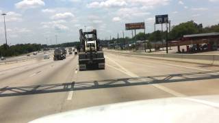 2000 International Tractor Truck in the highway with a 40 TON lowboy