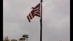 Disgraceful - Torn flag flying over Bank of America 