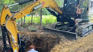 How To Install A Sump Pump Drain Line - Run It Outside!