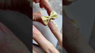 Making bow tie pasta just like nonna taught me - polymer clay edition #clayring #claycharms #diy