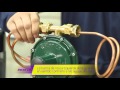 Como instalar un regulador de gas Envasado para tubos con dos flexibles.