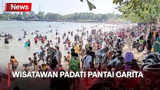 Wisatawan Padati Pantai Carita, Pengunjung Datang dari Subuh Hindari kemacetan Arus Lalu Lintas
