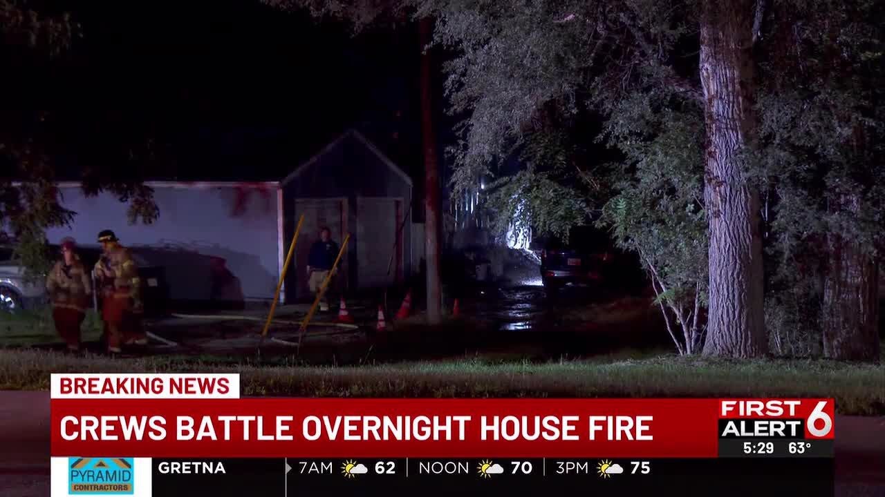 Crews fight South Omaha house fire - YouTube