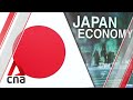 Japan's pandemic-hit economy returns to growth in July-Sep quarter