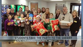 Visitors bring Christmas party to local sheriff's office