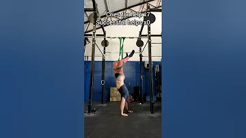 Guy's Pants Come Off as He Trains Upside Down With Resistance Band at Gym - 1418897