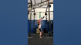 Guy's Pants Come Off as He Trains Upside Down With Resistance Band at Gym - 1418897