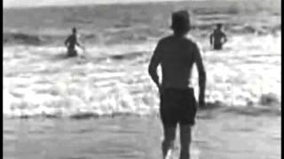 August 19, 1962 - President John F. Kennedy takes a swim at the beach in Santa Monica, CA.