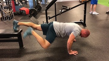 EricCressey.com: Feet-Elevated Spiderman Yoga Push-up