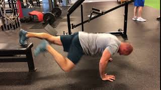 EricCressey.com: Feet-Elevated Spiderman Yoga Push-up