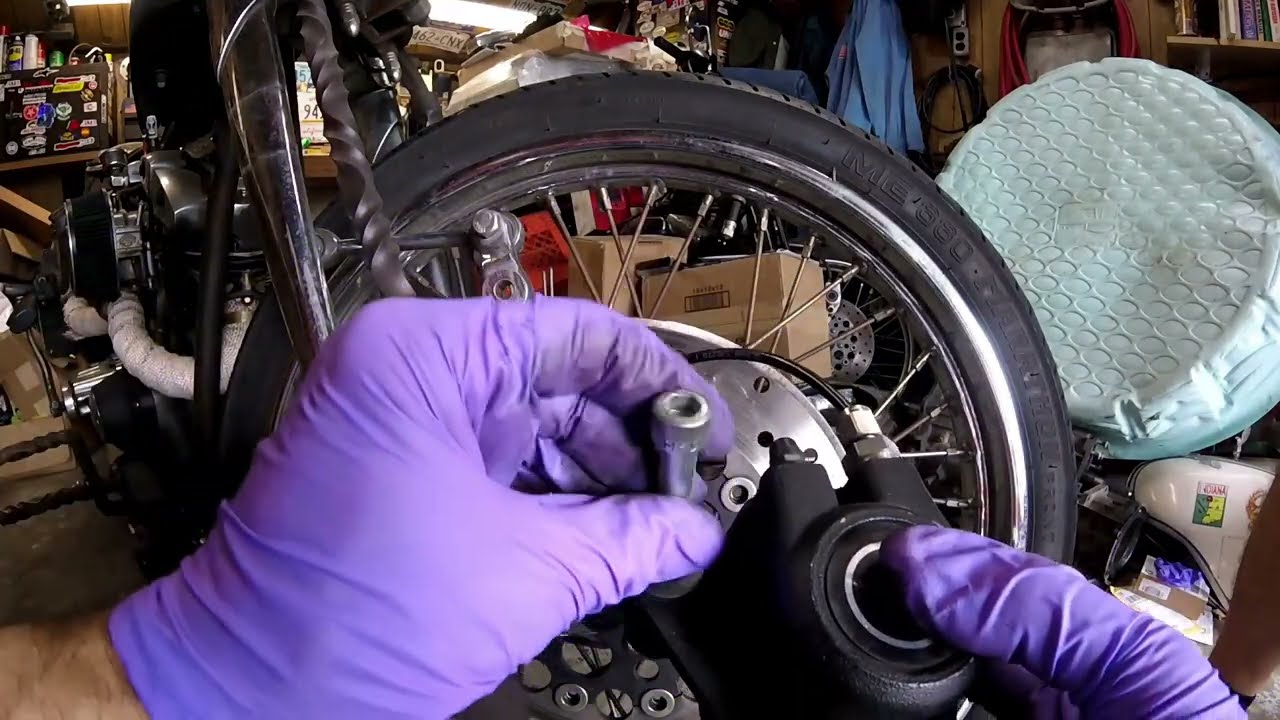 Replacing steering head neck bearing & Races. Harley lower triple
