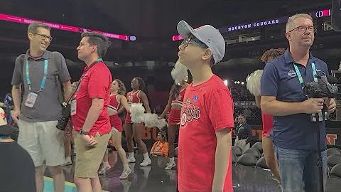 Meet the UH Coogs' secret weapon. 12-year-old ball boy has special bond with coach, players