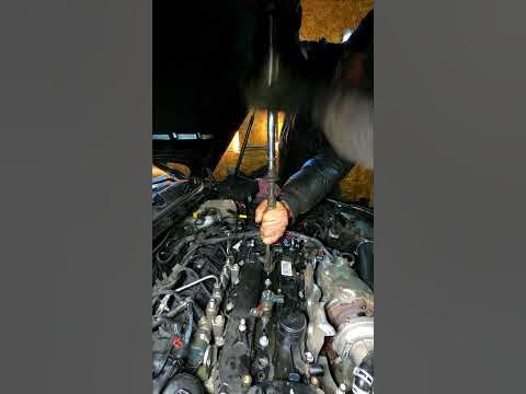 removing a stuck fuel injector #shorts - YouTube
