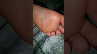 Close up of sleeping girlfriends foot