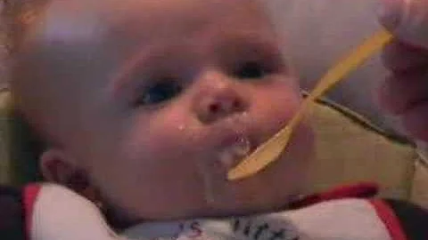 Carter Burnett eating solid food for 1st time