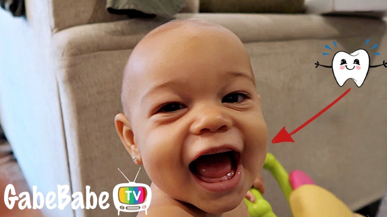 HER FIRST TOOTH! - YouTube