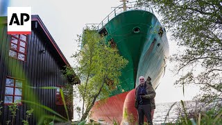Norwegian man wakes up to find grounded cargo ship narrowly missed his home